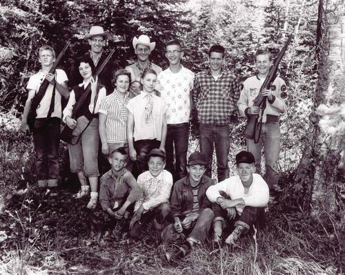 Montana's first certified hunter education class is pictured in 1957 in a black and white photograph. Pat McVay is in the back row, second from left.